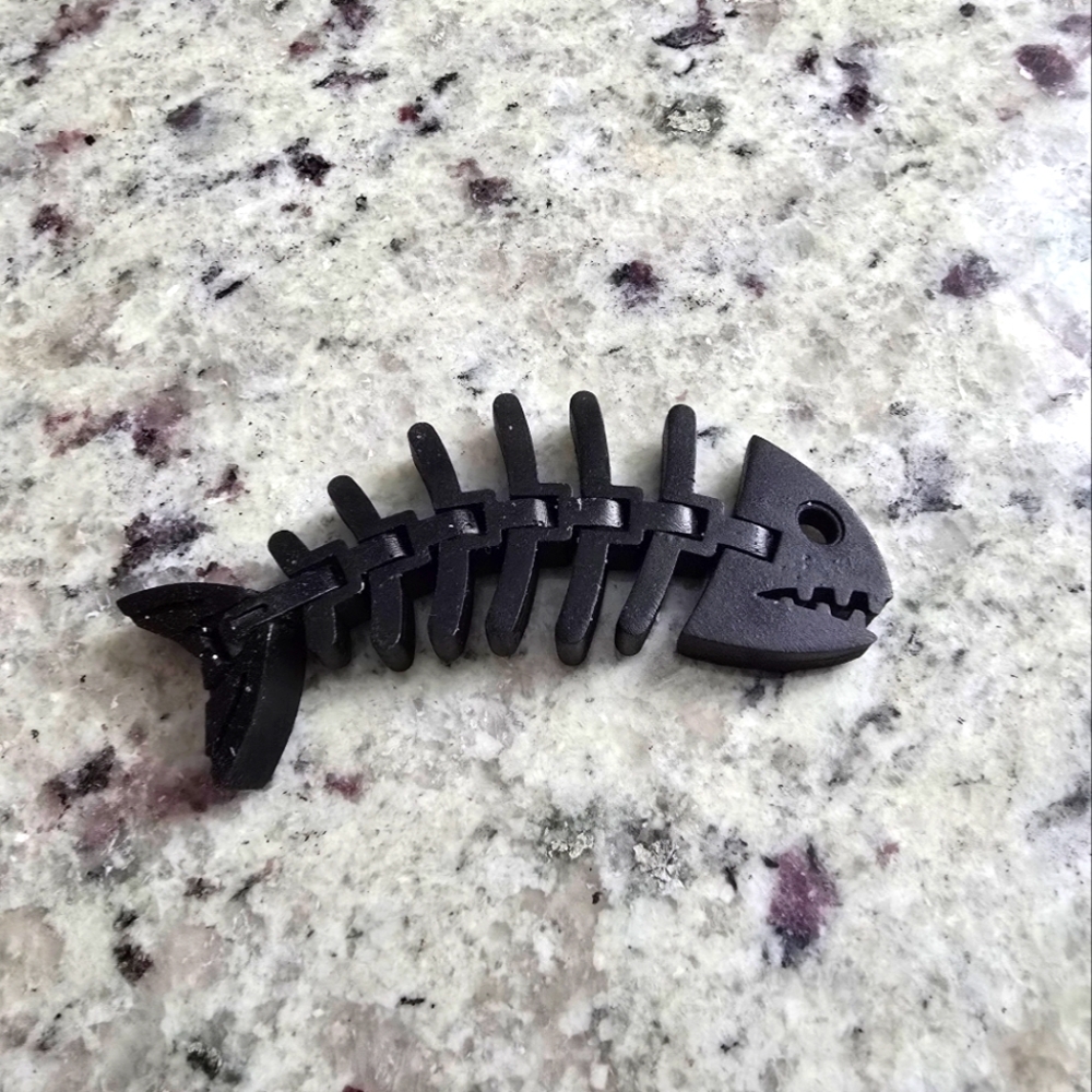 Black Action Figure Fish Skeleton Toy